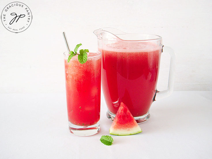 The finished pitcher and filled glass of Watermelon Agua Fresca With Mint.