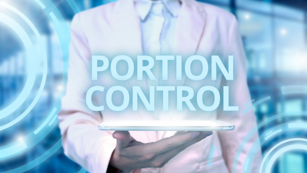 A male holding a tablet like a tray with the words, "portion control" written over it.