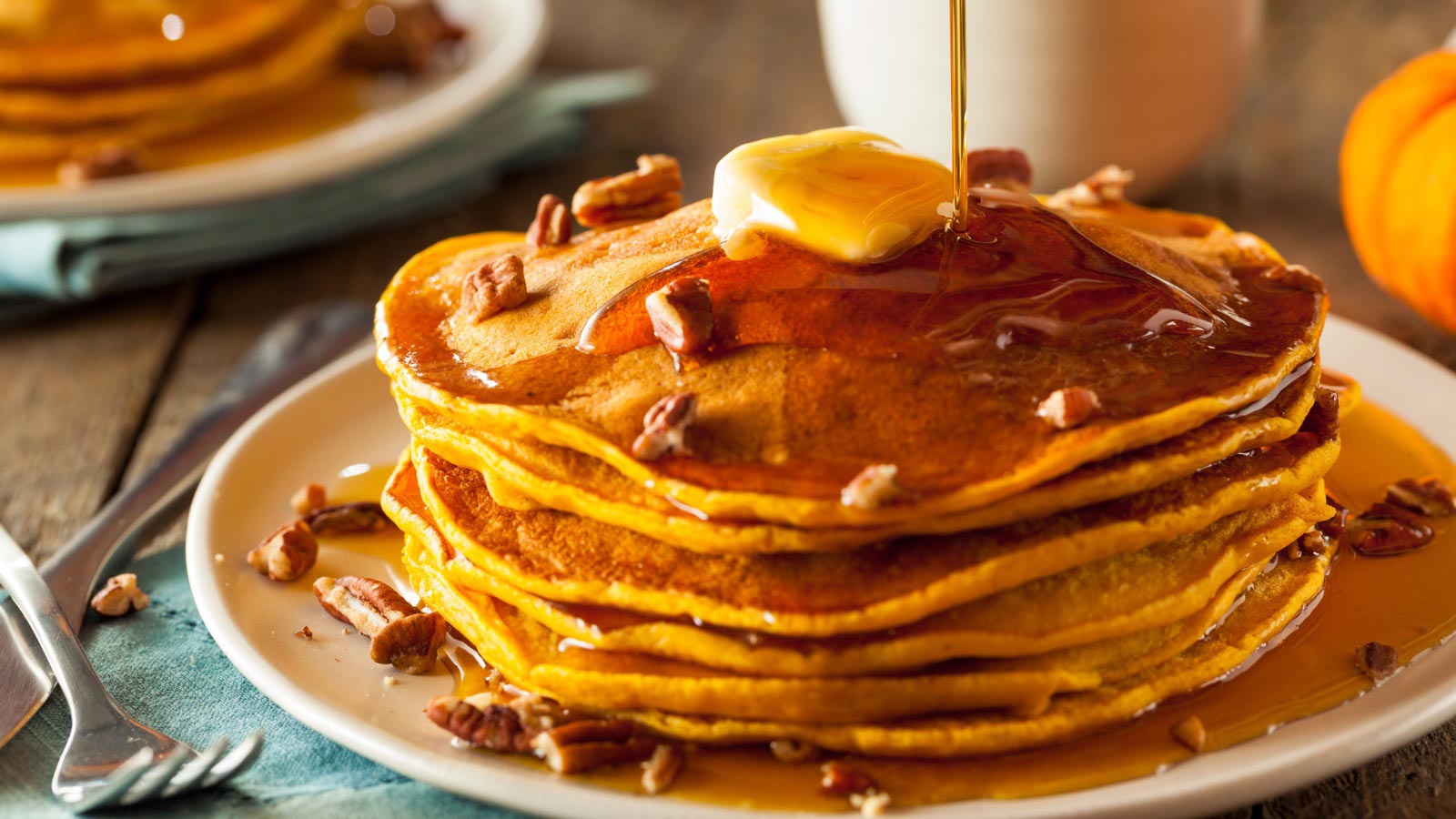 Homemade Pumpkin Pancakes with Butter Pecans and Maple Syrup
