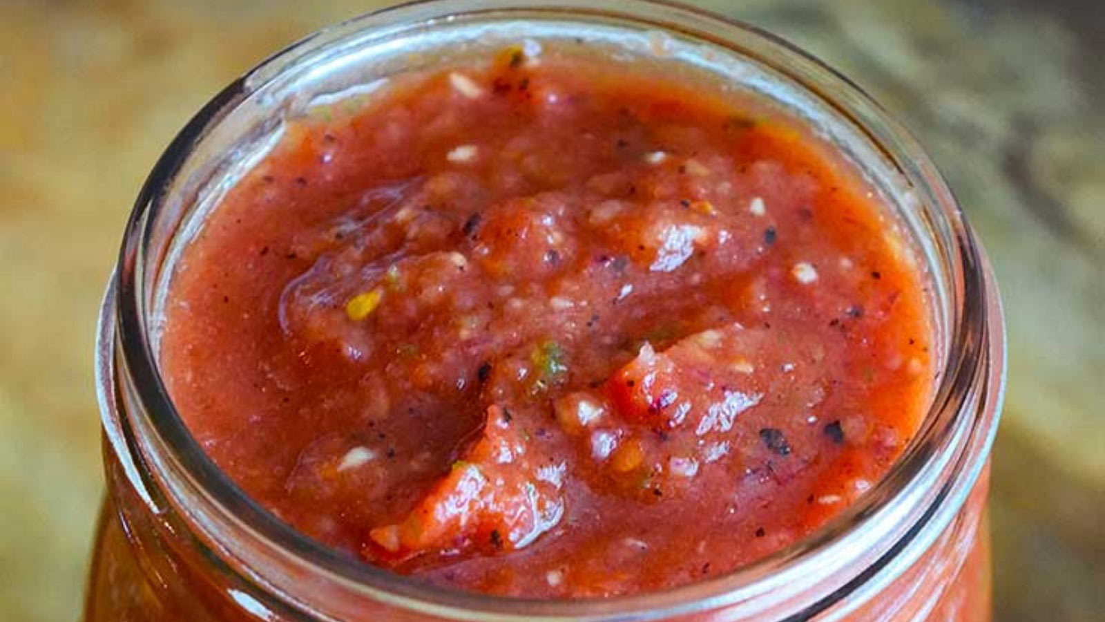 Restaurant Salsa in a canning jar with the lid off.