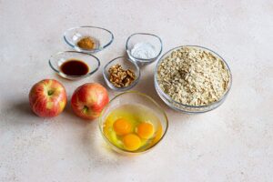 Oat cake ingredients gathered in individual bowls.