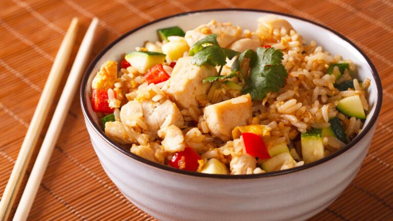 Asian fried rice close up in a bowl on a table.